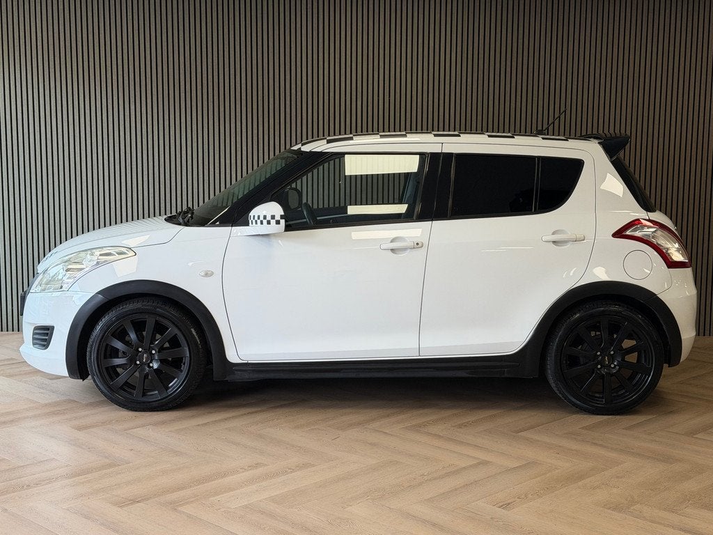 Suzuki Swift 1.2 Exclusive AUTOMAAT AIRCO CAMERA MEDIASCHERM, Auto's, Suzuki, Stof, 4 cilinders, Met garantie (alle), Elektrische ramen