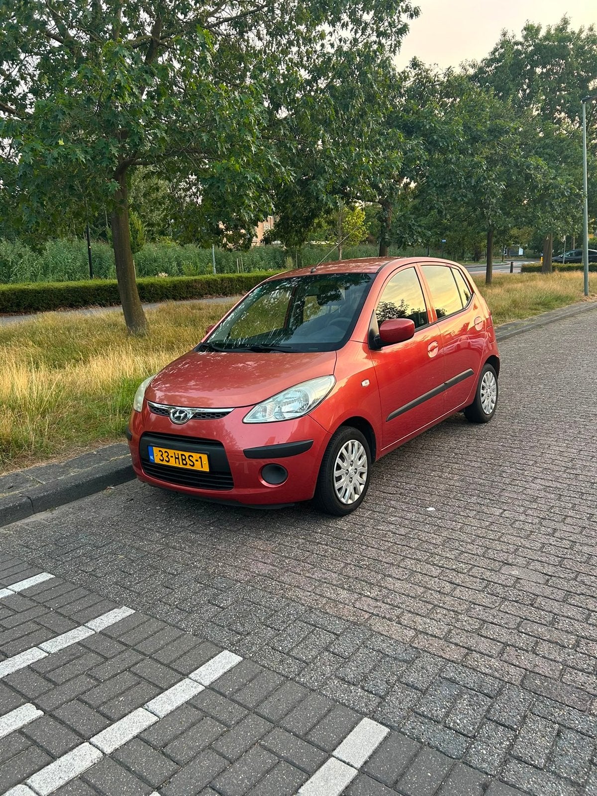 Hyundai i10 61.991km 2008 rood, Auto's, Hyundai, Voorwielaandrijving, Dealer onderhouden, 31 €/maand, 4 cilinders