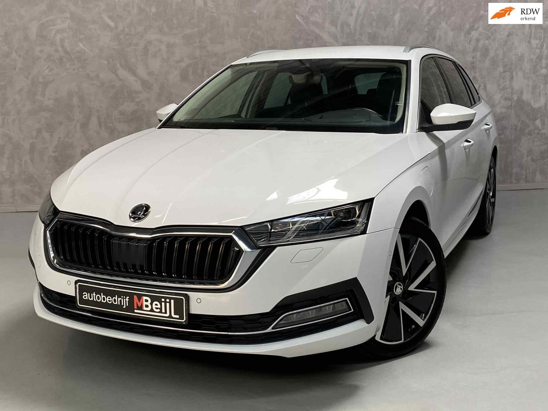 Skoda Octavia Combi 1.4 TSI iV PHEV Business Edition Plus /H, Auto's, Skoda, Gebruikt, Euro 6, 150 pk, Wit