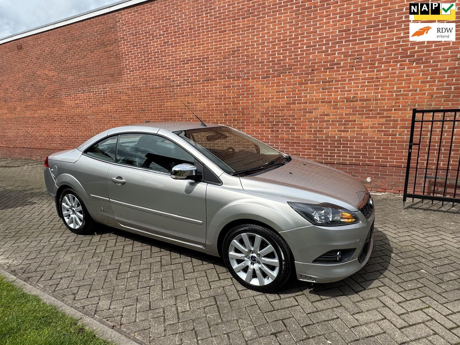 Ford Focus Coupé-Cabriolet 2.0 Limited Navi Cruise Clima St, Auto's, Ford, Euro 5, Zwart, 4 stoelen, Bedrijf