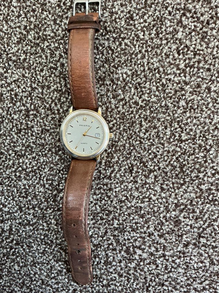 Prisma herenhorloge, Sieraden, Tassen en Uiterlijk, Horloges | Heren, Overige merken, Polshorloge, Ophalen of Verzenden, Leer