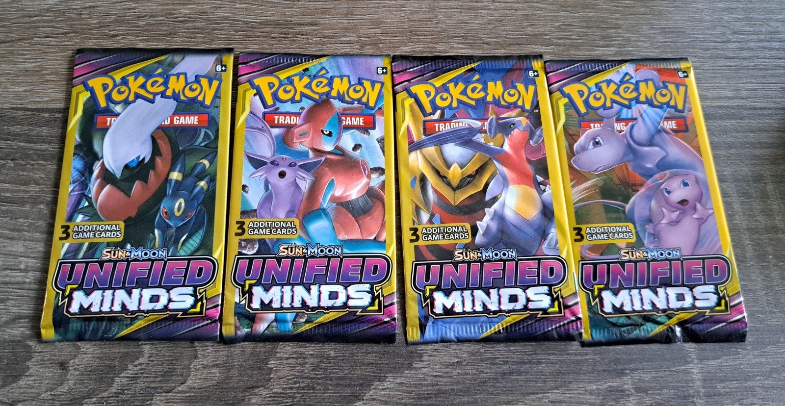 USA Pokémon Sun & Moon Unified Minds Dollar Packs, Ophalen of Verzenden, Nieuw, Booster