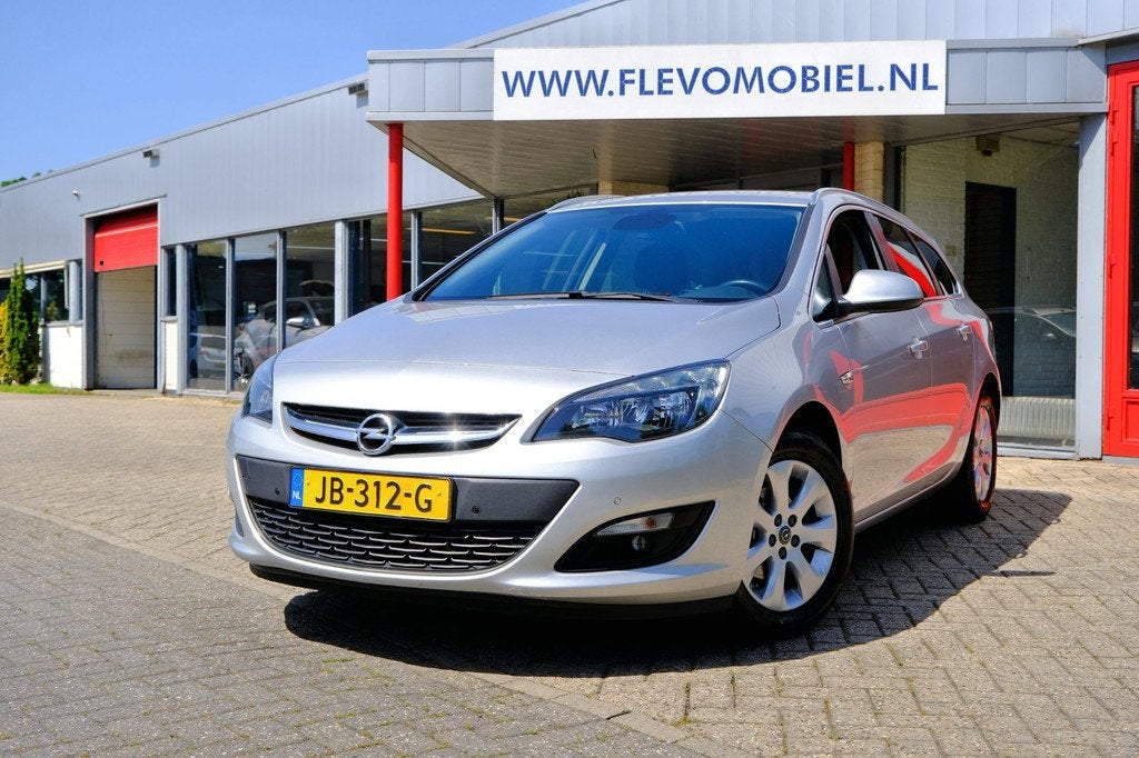 Opel Astra Sports Tourer 1.4 Turbo Blitz Navi|Airco|LMV|PDC, Auto's, Voorwielaandrijving, Gebruikt, Euro 6, Origineel Nederlands