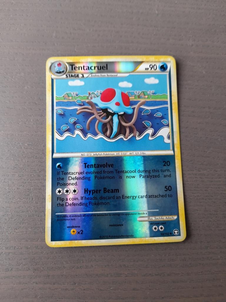 Triumphant 50/102 tentacruel reverse, Ophalen of Verzenden, Gebruikt, Losse kaart, Foil