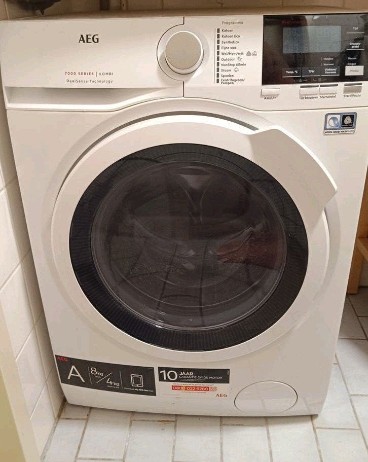 AEG Was-droogcombinatie L7WB86GW, Ophalen, Gebruikt, 1600 toeren of meer, 85 tot 90 cm
