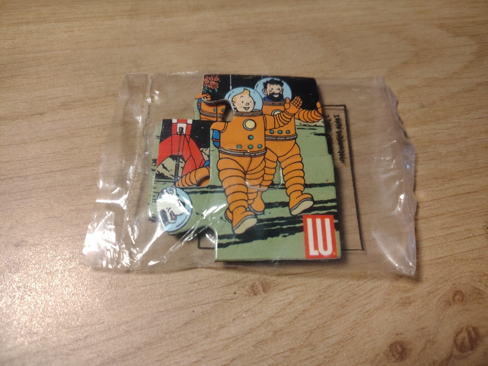 Kuifje Lu Puzzeltje NIEUW, Verzamelen, Stripfiguren, Ophalen of Verzenden, Kuifje, Nieuw, Beeldje of Figuurtje