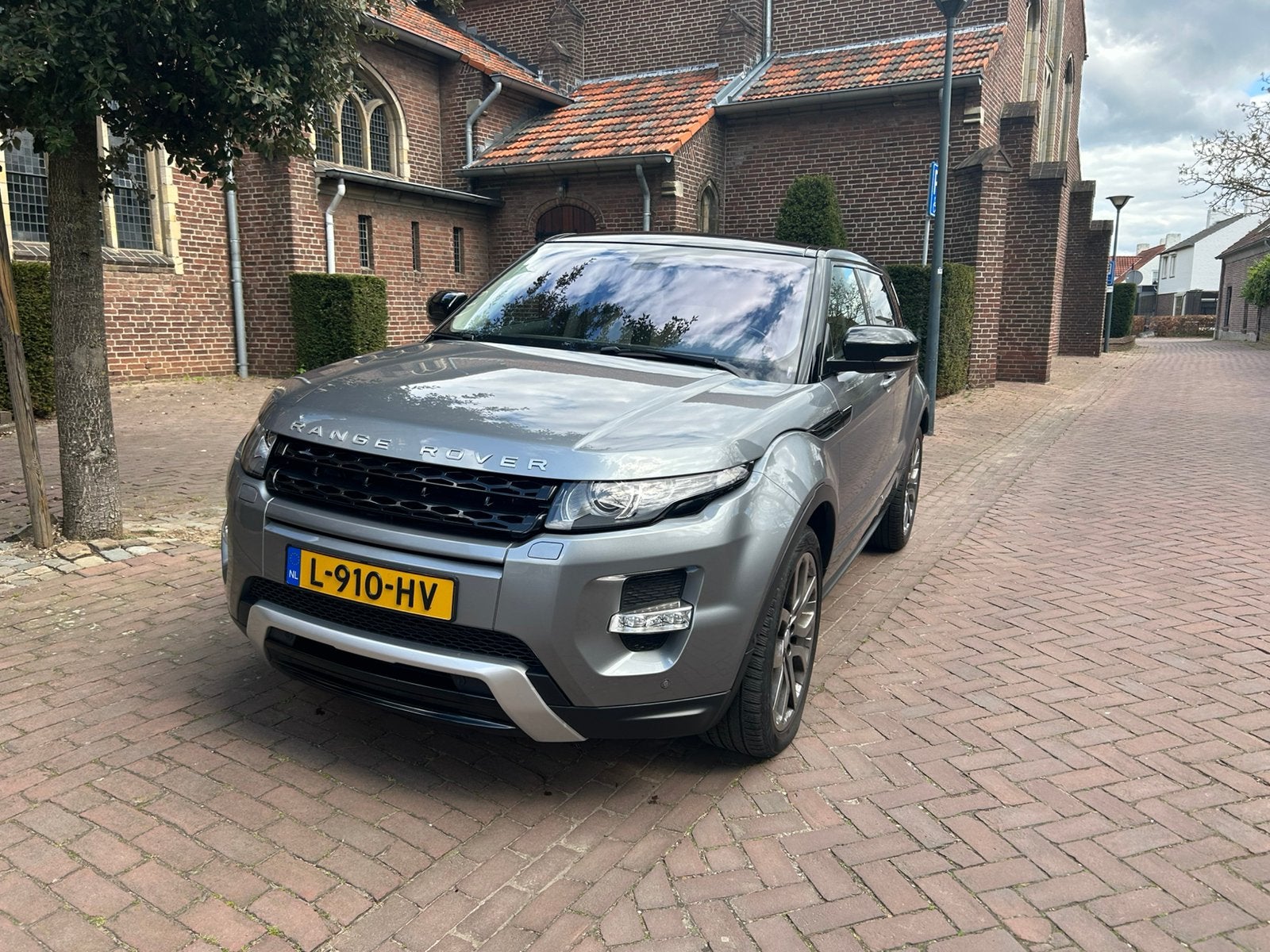 Land Rover Range Rover Evoque SI4 4WD AUT 2012 Grijs, Auto's, Automaat, 1800 kg, 4 cilinders, 11 km/l