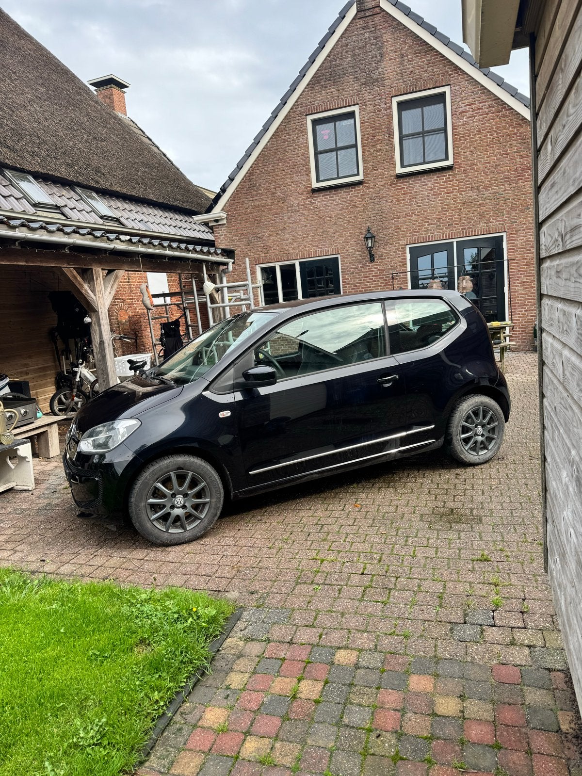 Volkswagen up! 1.0 44KW 2012 Zwart 134417 km, Voorwielaandrijving, Up!, 4 stoelen, Zwart