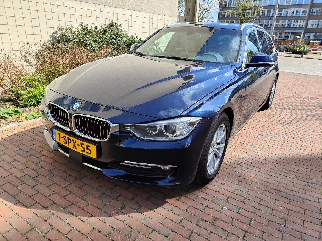 BMW 3-Serie 320D EDE High Executive Touring AUT 2013 Blauw, Auto's, Automaat, Achterwielaandrijving, 1995 cc, Beige
