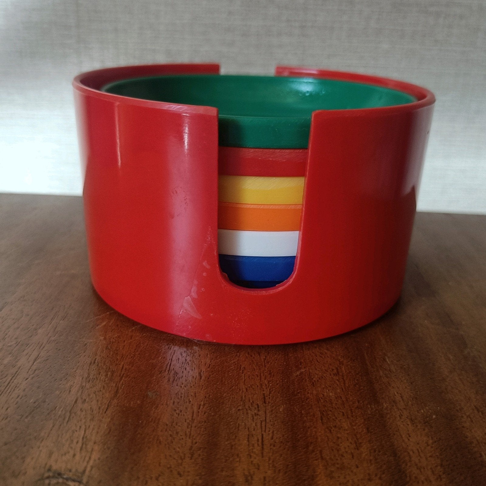 vintage kleurige kunststof onderzetters in houder, Ophalen of Verzenden, Kunststof