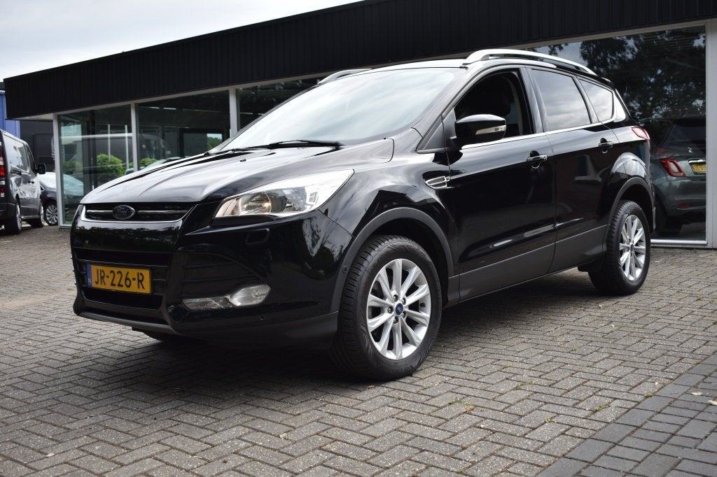 Ford Kuga 1.5 Titanium+Stylingpack CAMERA CRUISE NAVI PDC CL, Auto's, Euro 6, 4 cilinders, Leder en Stof, Zwart
