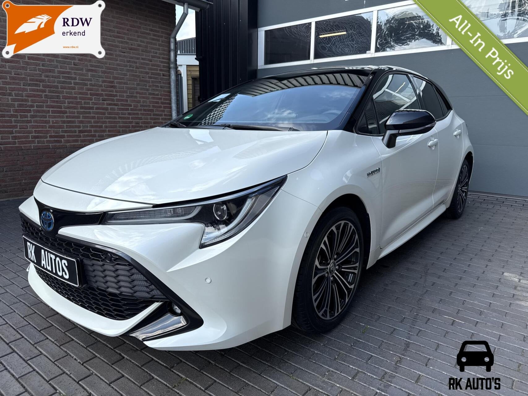 Toyota Corolla 2.0 Hybrid Dynamic / Navi / Camera / Bi-Tone, Auto's, Stof, Gebruikt, 4 cilinders, Corolla