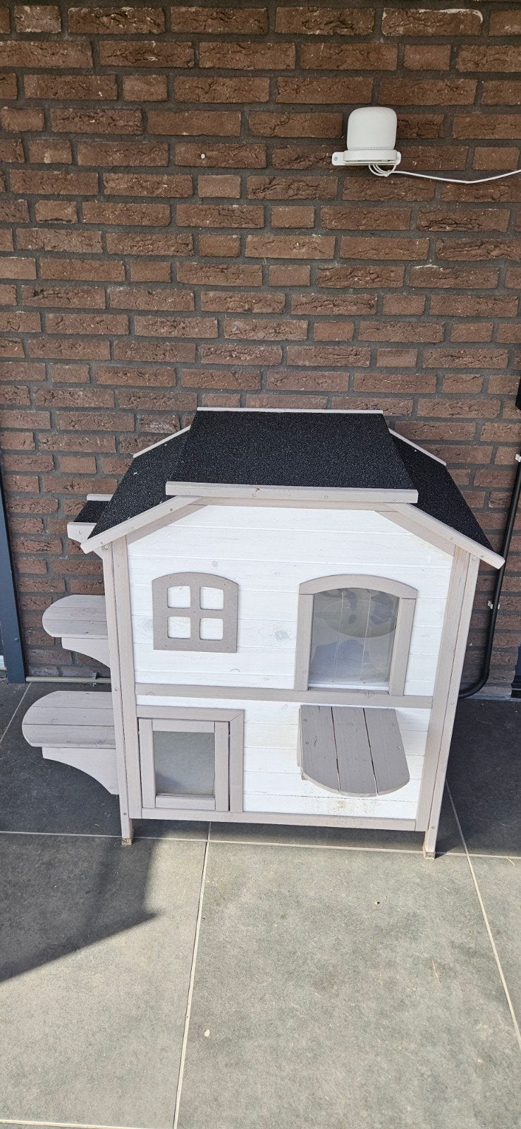 Houten kattenhuis voor buiten, Ophalen