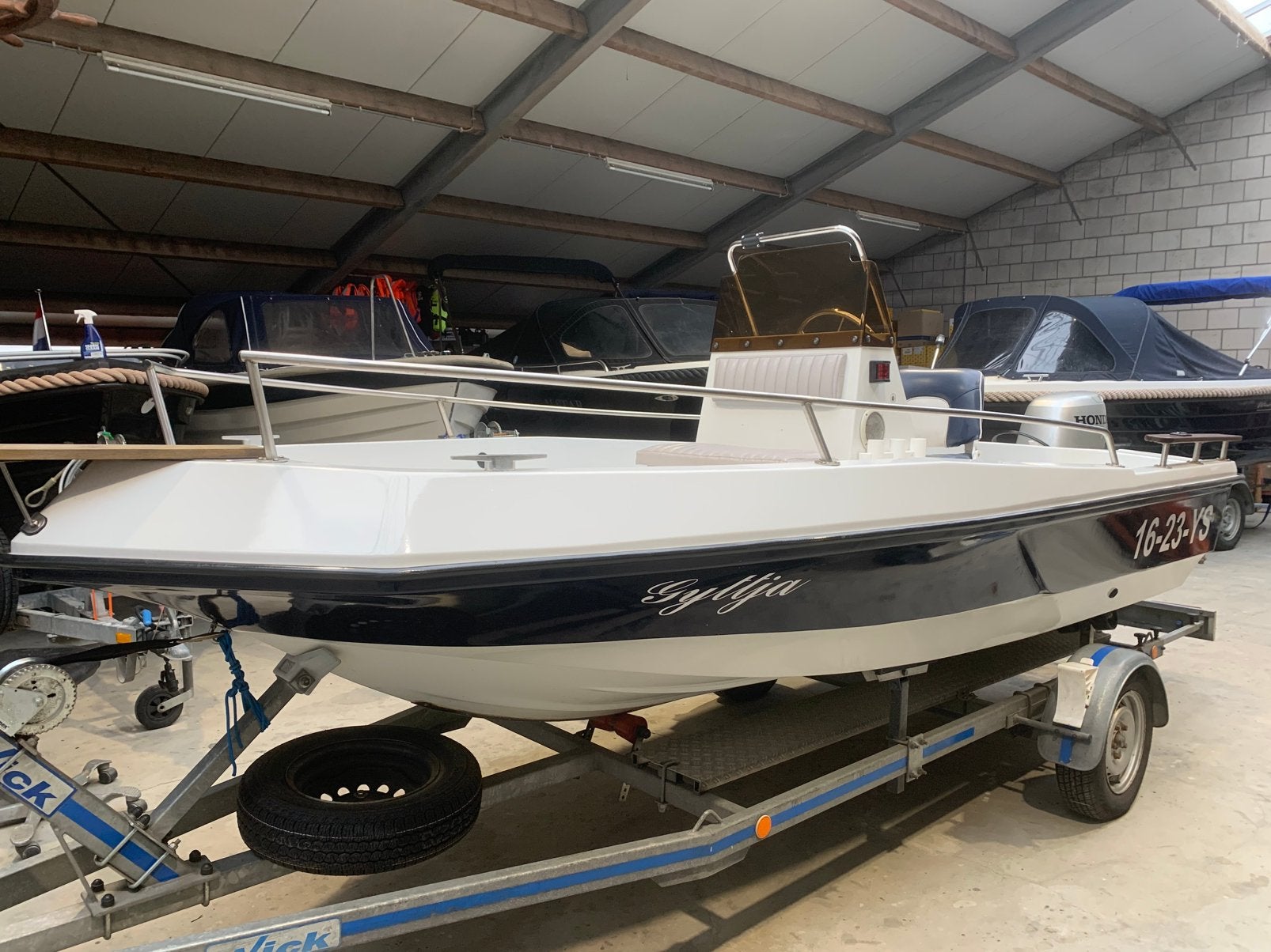 Elan 450 met honda 40 pk 4 takt en trailer, Watersport en Boten, Met afstandsbediening, Ophalen of Verzenden, Zo goed als nieuw