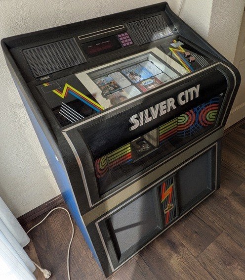 NSM Silver City CD Jukebox, Verzamelen, Zo goed als nieuw, 1970 tot heden, Ophalen, Met singles