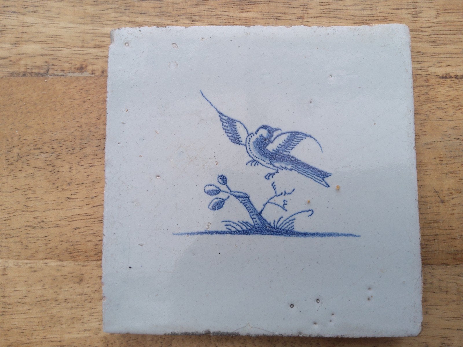 Antieke Delfts blauwe tegel met vogelmotief, Ophalen of Verzenden