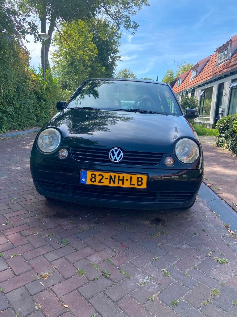 Volkswagen Lupo 1.4 55KW AUT 2001 Zwart, Auto's, Volkswagen, 31 €/maand, 4 cilinders, 4 stoelen, 14 km/l