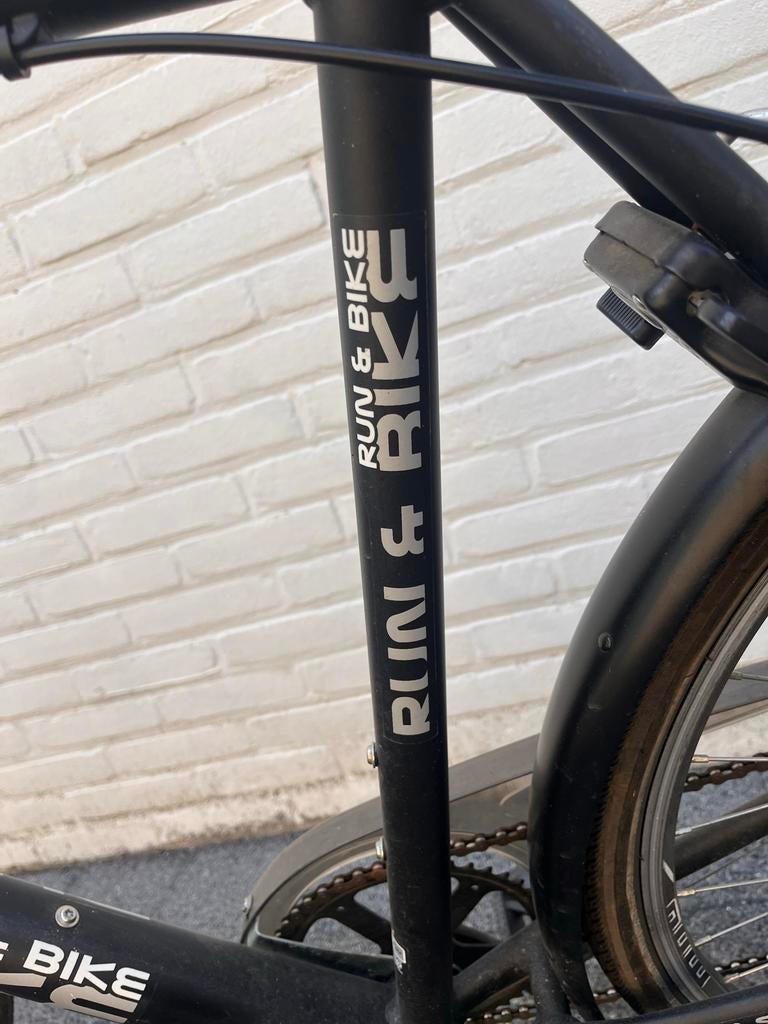Sportieve 28 inchZwarte Run & Bike fiets met 7 versnellingen, Overige merken, 20 inch of meer, Heren, Versnellingen