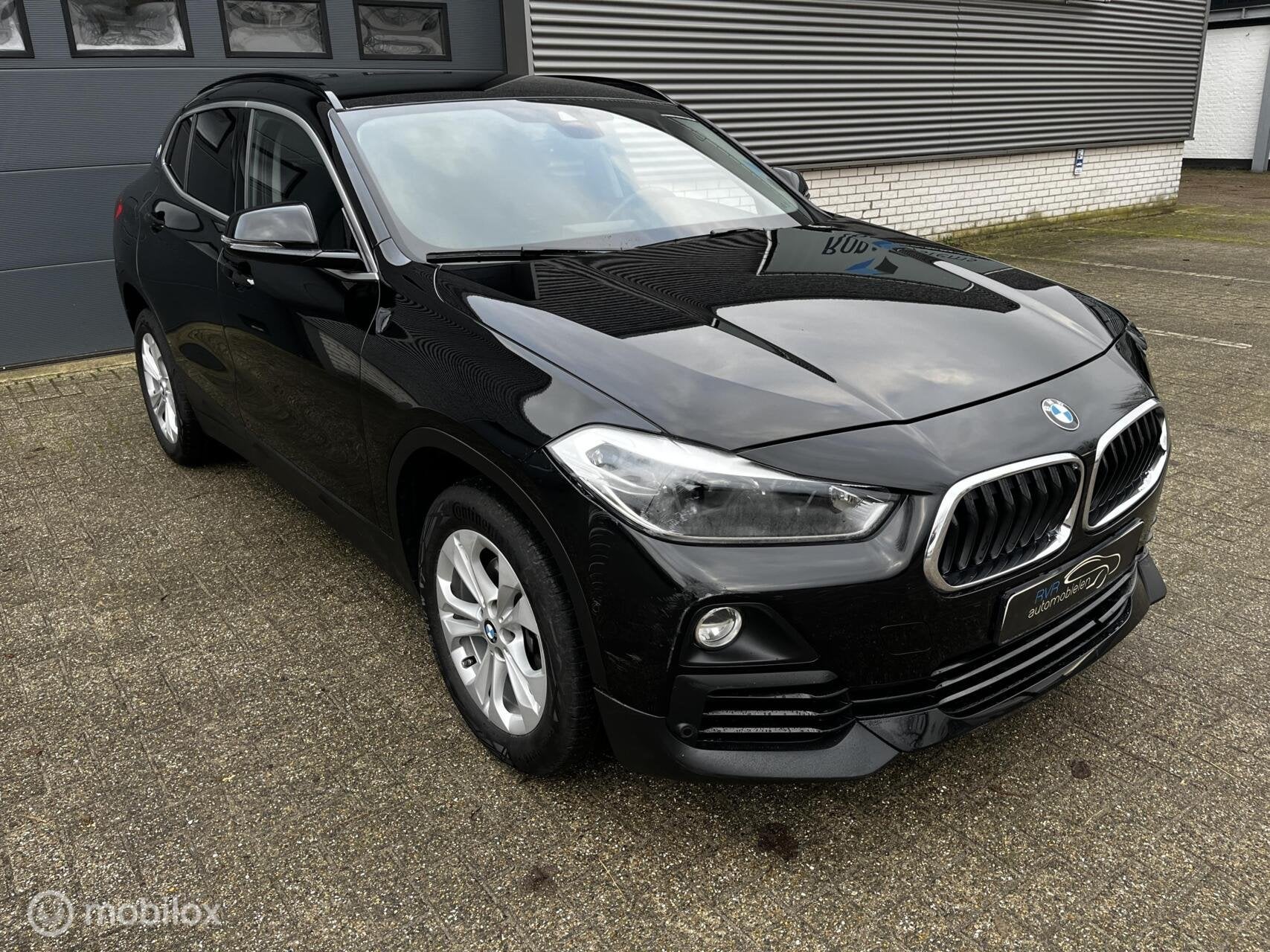 BMW X2 sDrive18i Executive, Auto's, Automatische klimaatregeling, Gebruikt, Zwart, Bedrijf