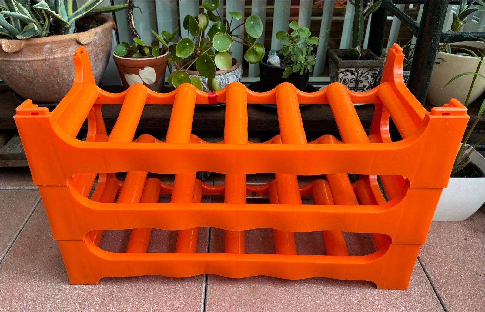 Vintage oranje wijnrek 70-er jaren - Modulair (18 flessen), Kunststof, Gebruikt, 15 tot 25 flessen, Ophalen of Verzenden