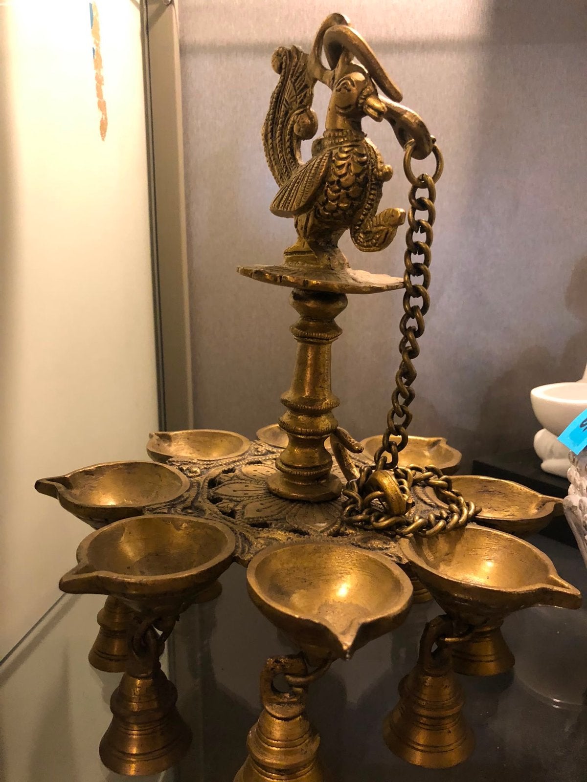 Antieke Indiase olielamp ( messing) met pauwdecoratie, Ophalen of Verzenden, Koper