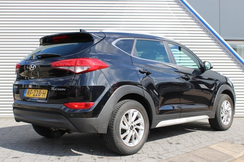 Hyundai Tucson 1.6 GDi Comfort | Navi | Camera | Stoelverwar, Auto's, Voorwielaandrijving, Stof, Gebruikt, 4 cilinders
