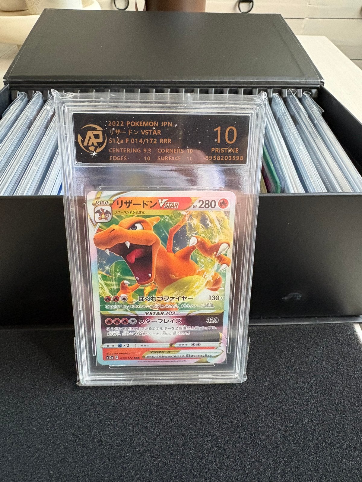 Charizard vstar pristine 10, Ophalen of Verzenden, Zo goed als nieuw, Meerdere kaarten, Foil