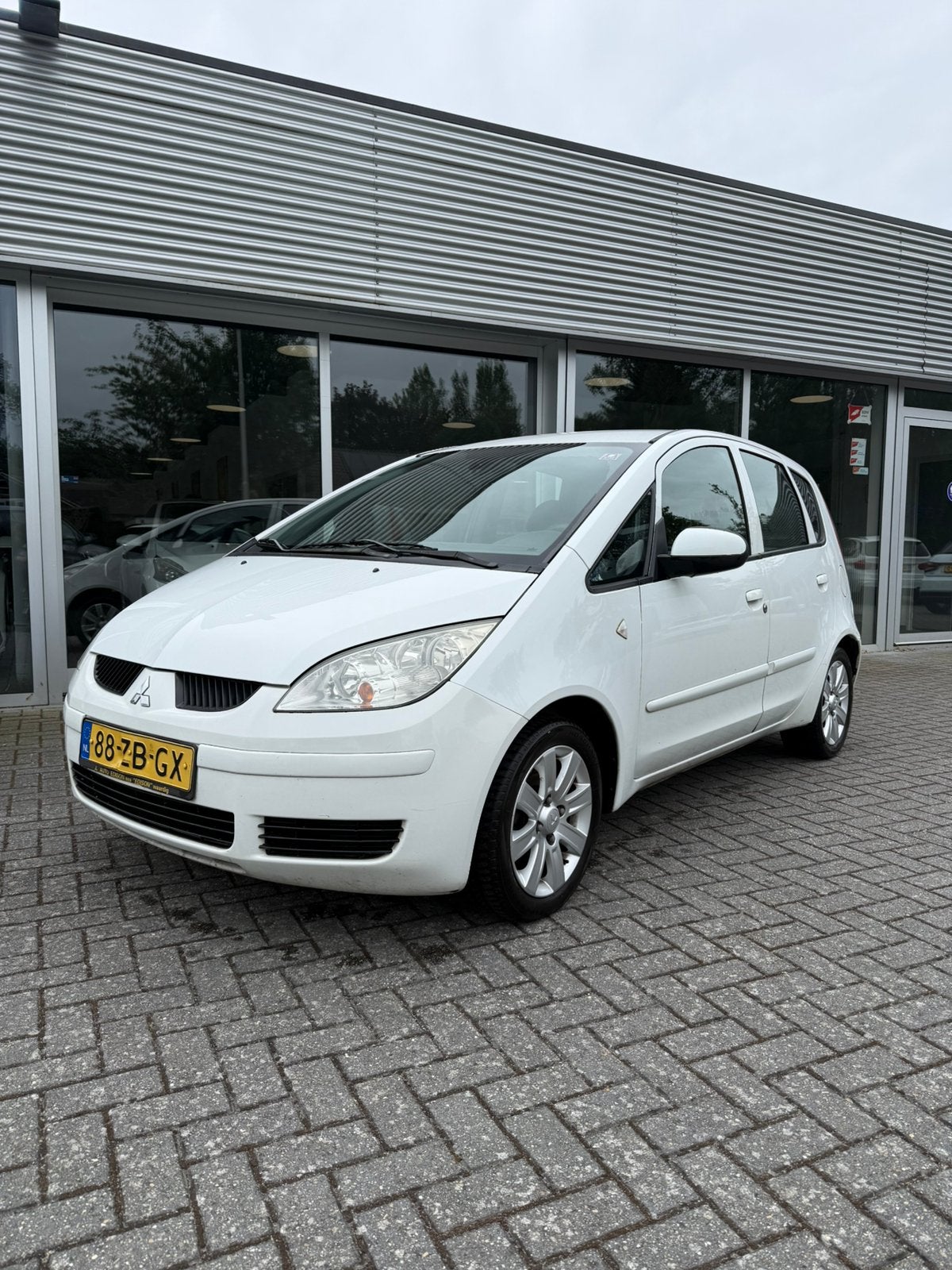 Mitsubishi Colt 1.3 CZ5 2007 Wit, Auto's, Mitsubishi, Particulier, Colt, Airbags, Airconditioning, Elektrische ramen, Lichtmetalen velgen