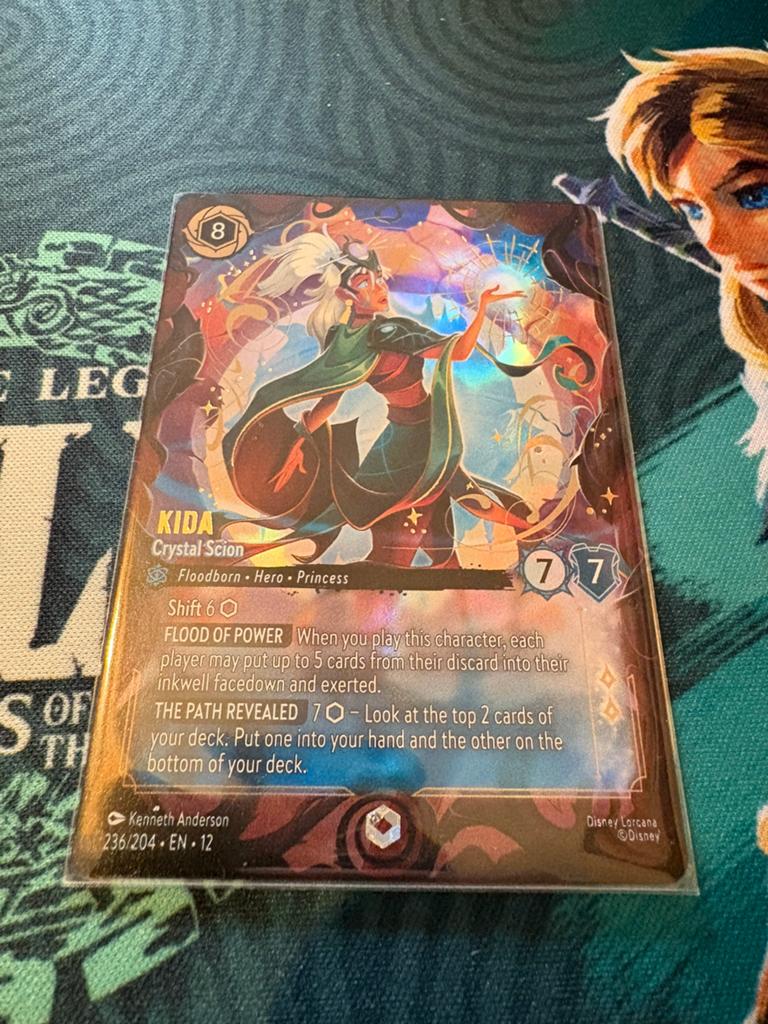 Lorcana Wilds Unknown Kida Crystal Scion Enchanted, Ophalen of Verzenden, Zo goed als nieuw, Losse kaart, Foil