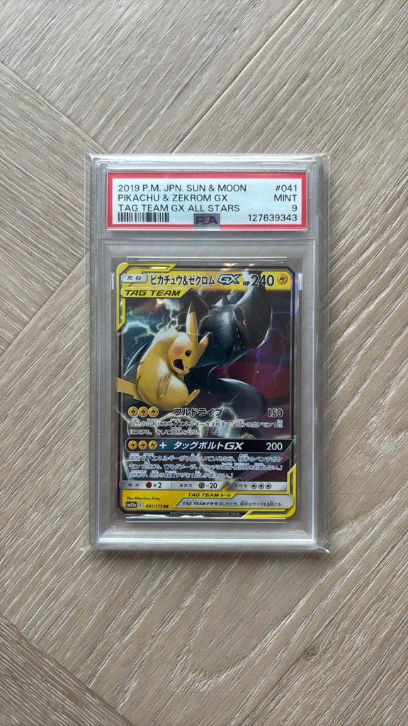 PSA 9 Pikachu & Zekrom GX Japanese Tag Team, Hobby en Vrije tijd, Verzamelkaartspellen | Pokémon, Ophalen of Verzenden, Zo goed als nieuw