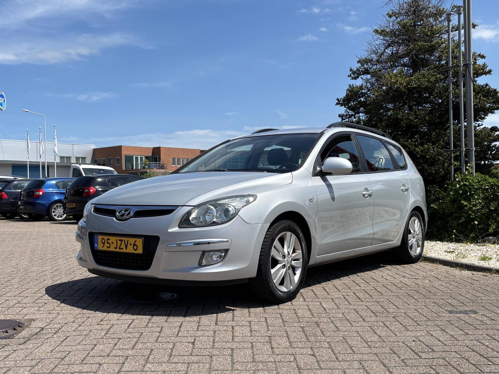 Hyundai i30 CW 1.4i Blue Dynamic, Trekhaak, Airco, Clima!, Auto's, Voorwielaandrijving, Stof, Zwart, 4 cilinders
