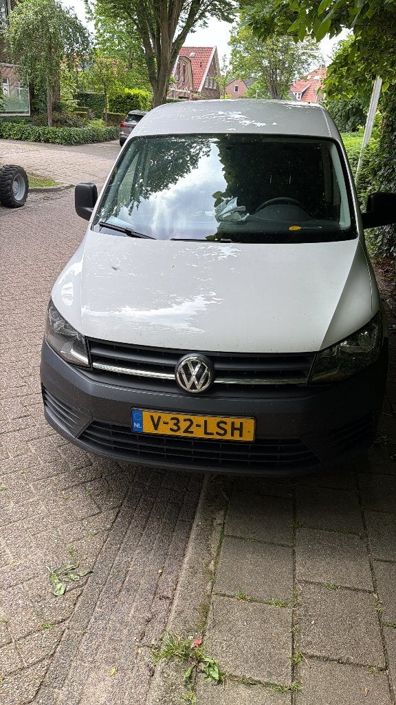 Volkswagen Caddy 1.2 TSI met BMT L1h1 84pk 2017 Wit, Auto's, Voorwielaandrijving, Euro 5, Zwart, 4 cilinders