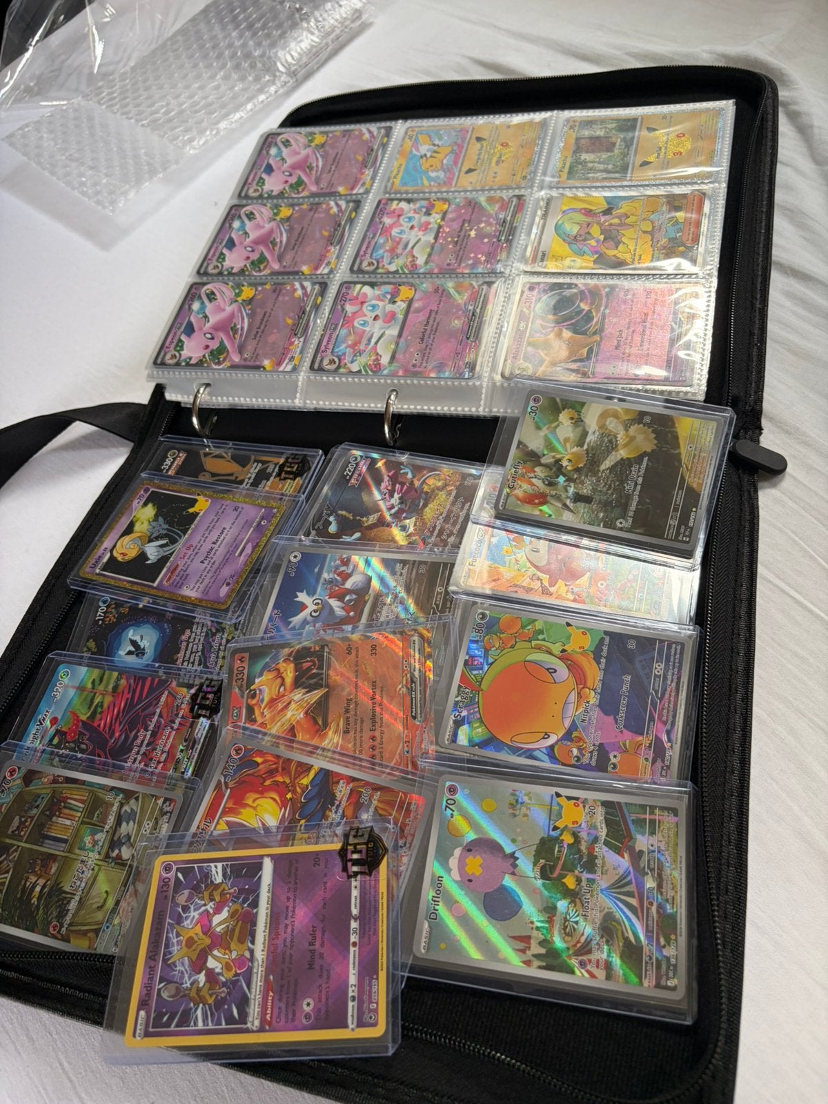 Foto 15 van Pokémon collectie: toploaders, PSA 10 Meditite, binder vol
