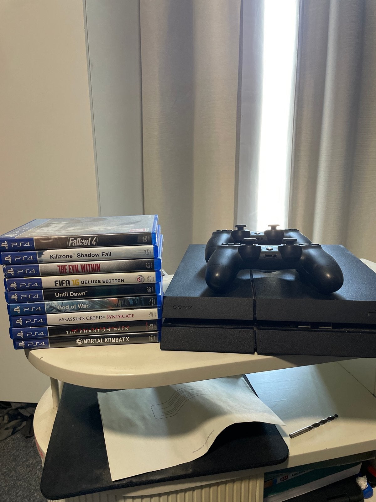 PlayStation 4 met 2 controllers en 9 games, Ophalen, Met 2 controllers, Original, 500 GB