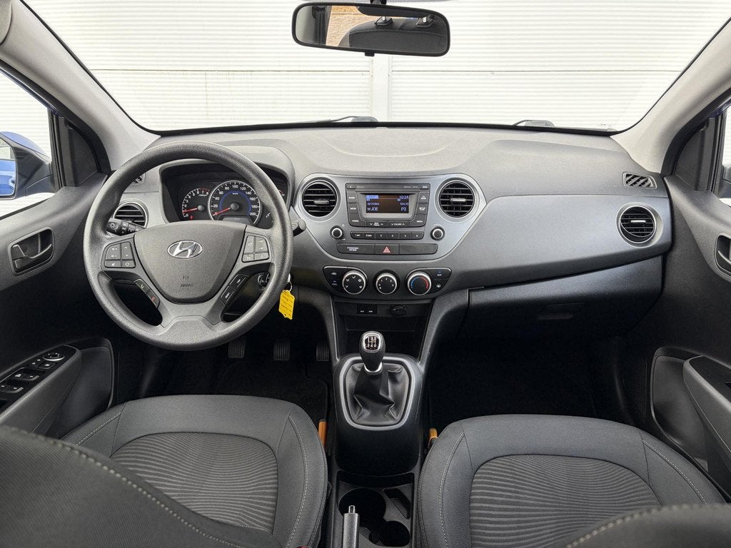 Hyundai i10 1.0i Comfort / Airco / Cruise control /, Stof, Gebruikt, Origineel Nederlands, Handgeschakeld