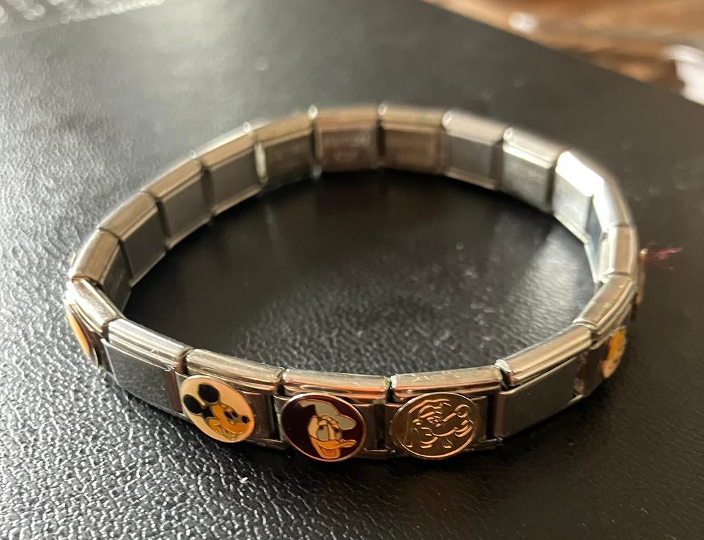 Elemento armband met 12 bedeltjes – Disney / cartoon – RVS, Sieraden, Tassen en Uiterlijk, Armbanden, Zo goed als nieuw, Staal