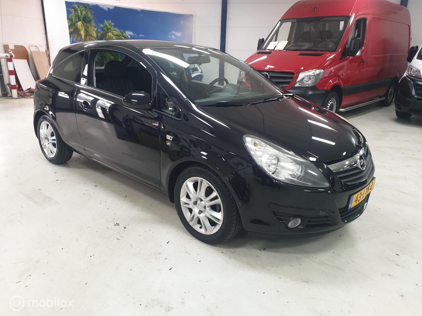 Opel Corsa 1.2-16V Cosmo 2010 Airco! 86 PK, Auto's, Voorwielaandrijving, Euro 5, 1229 cc, Zwart