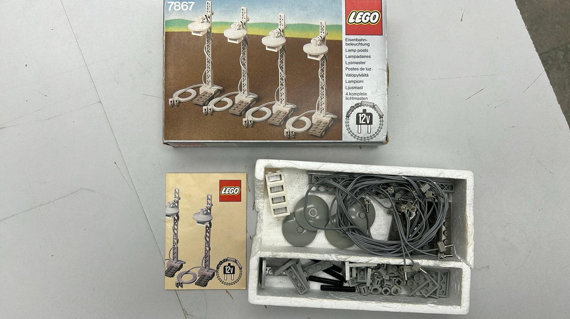 SB2928 Lego trein 12 V 7867 4 x lichtmast + doosje, Ophalen of Verzenden, Zo goed als nieuw