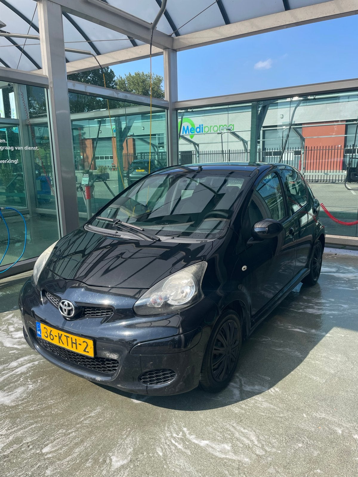 Toyota Aygo 1.0 12V Comfort Airco 2010, Auto's, Toyota, Voorwielaandrijving, Stof, Zwart, 4 stoelen