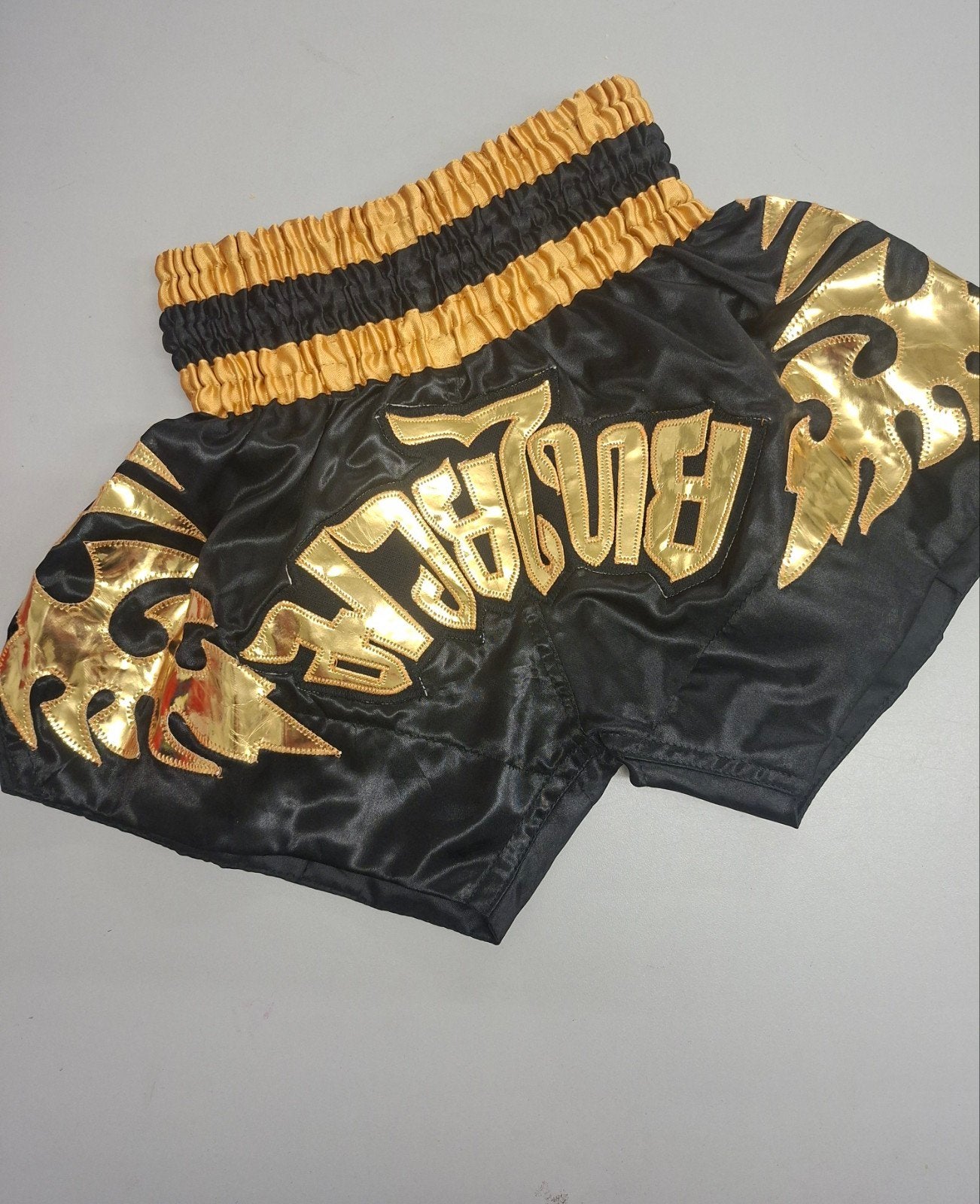 Zwarte en gouden kickbox sportbroek, maat SSS, Sport en Fitness, Vechtsporten en Zelfverdediging, Gebruikt, Overige, Maat XS of kleiner