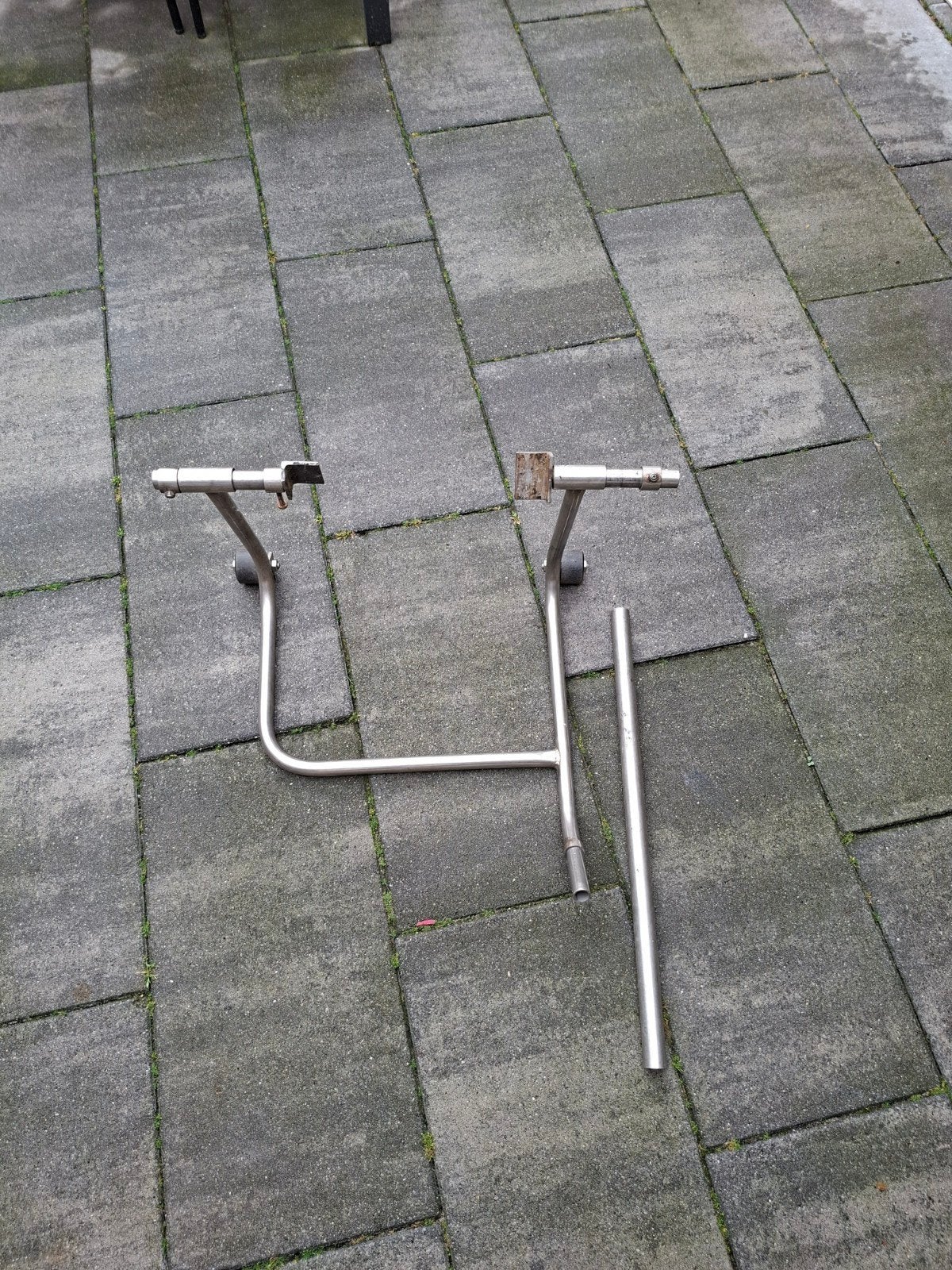 paddock stand, Ophalen
