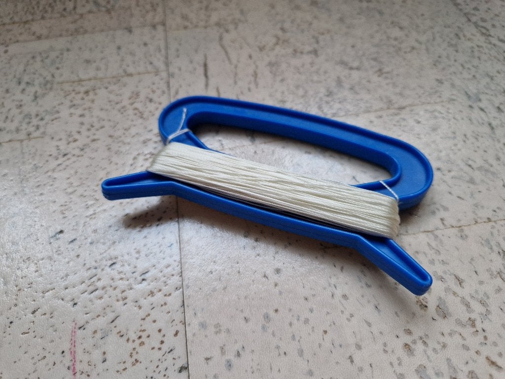 Blauwe vliegerhaspel met vliegertouw – Zo goed als nieuw, Ophalen of Verzenden, Zo goed als nieuw, Toebehoren