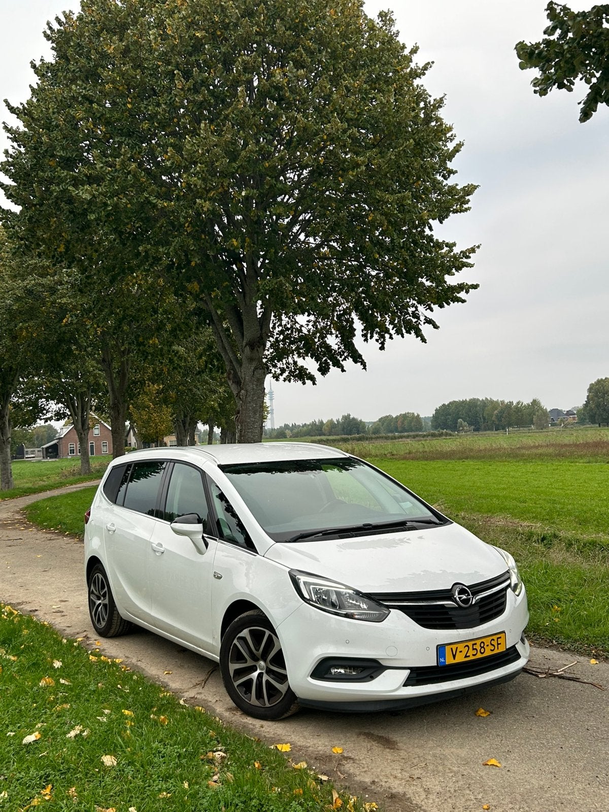 ✅ VAN / Opel Zafira TOURER - Origineel NL auto weinig KM, Auto's, 136 pk, 4 cilinders, Leder en Stof, Wit