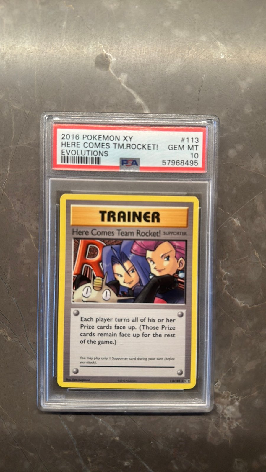 Pokemon Evolutions Here Comes TM Rocket PSA 10, Ophalen of Verzenden, Zo goed als nieuw