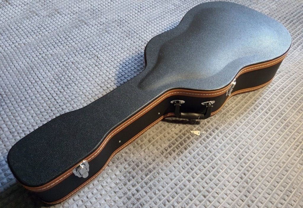 Kofferkoffer voor een akoestische gitaar