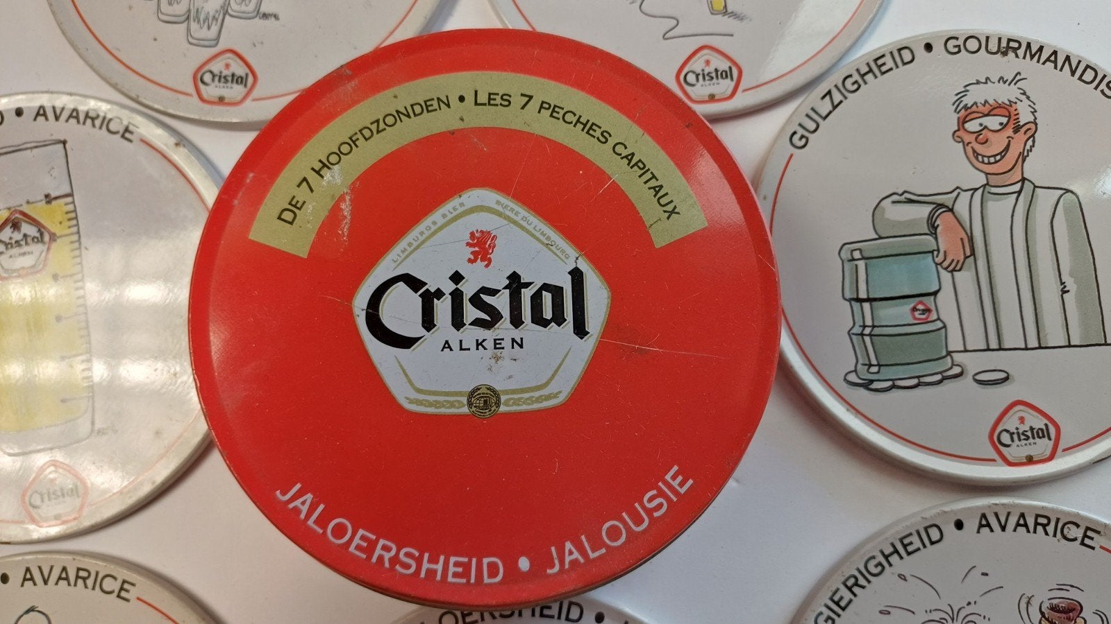 Vintage Cristal Alken Bier Viltjes met 7 Hoofdzonden in Blik, Verzamelen, Ophalen of Verzenden, Gebruikt, Overige, Overige merken