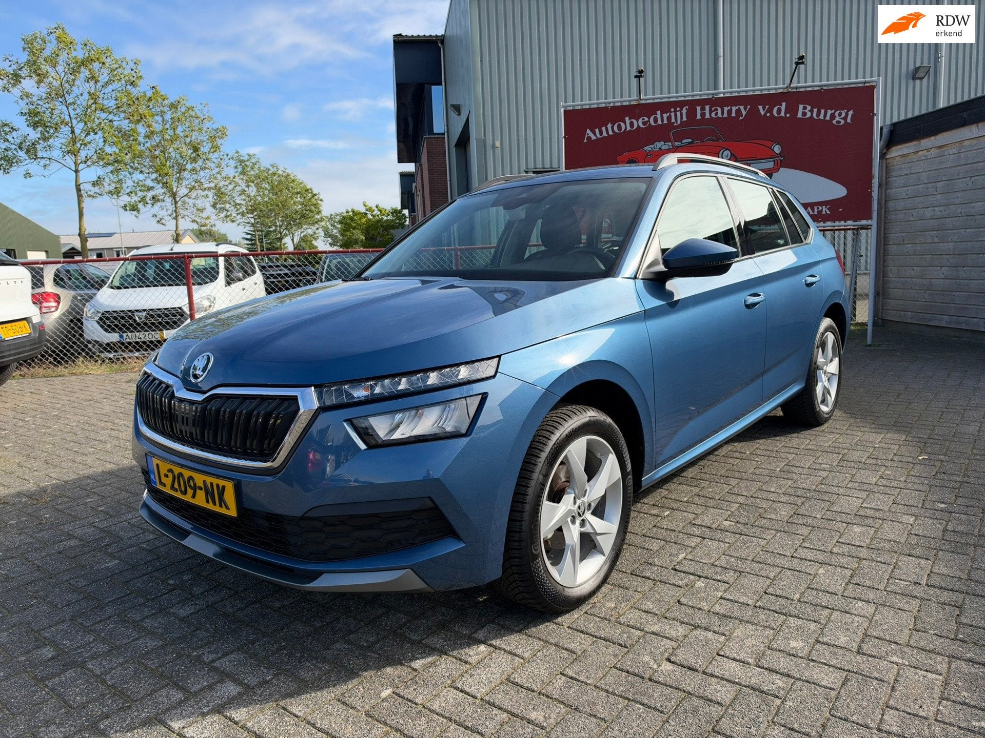 Skoda Kamiq 1.0 TSI Business Edition | Trekhaak | Apple Carp, Auto's, Stof, Gebruikt, Met garantie (alle), Blauw