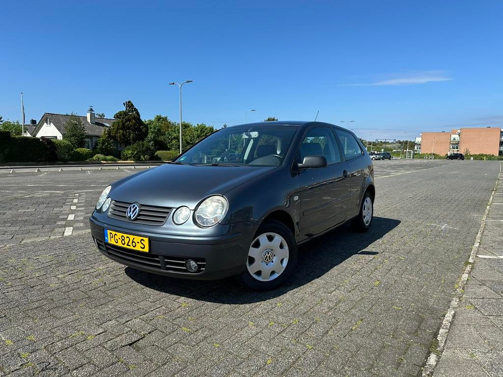 Volkswagen Polo 1.2 47KW 2005 Grijs, Auto's, Stof, 1198 cc, Handgeschakeld, Particulier