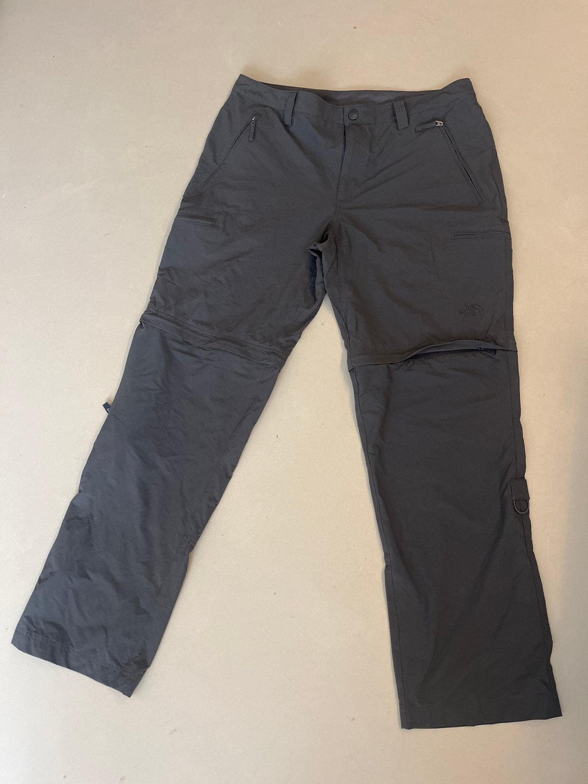 The North Face afritsbroek mannen donkergrijs - Maat 36, Ophalen of Verzenden, Zo goed als nieuw, Overige maten, Grijs