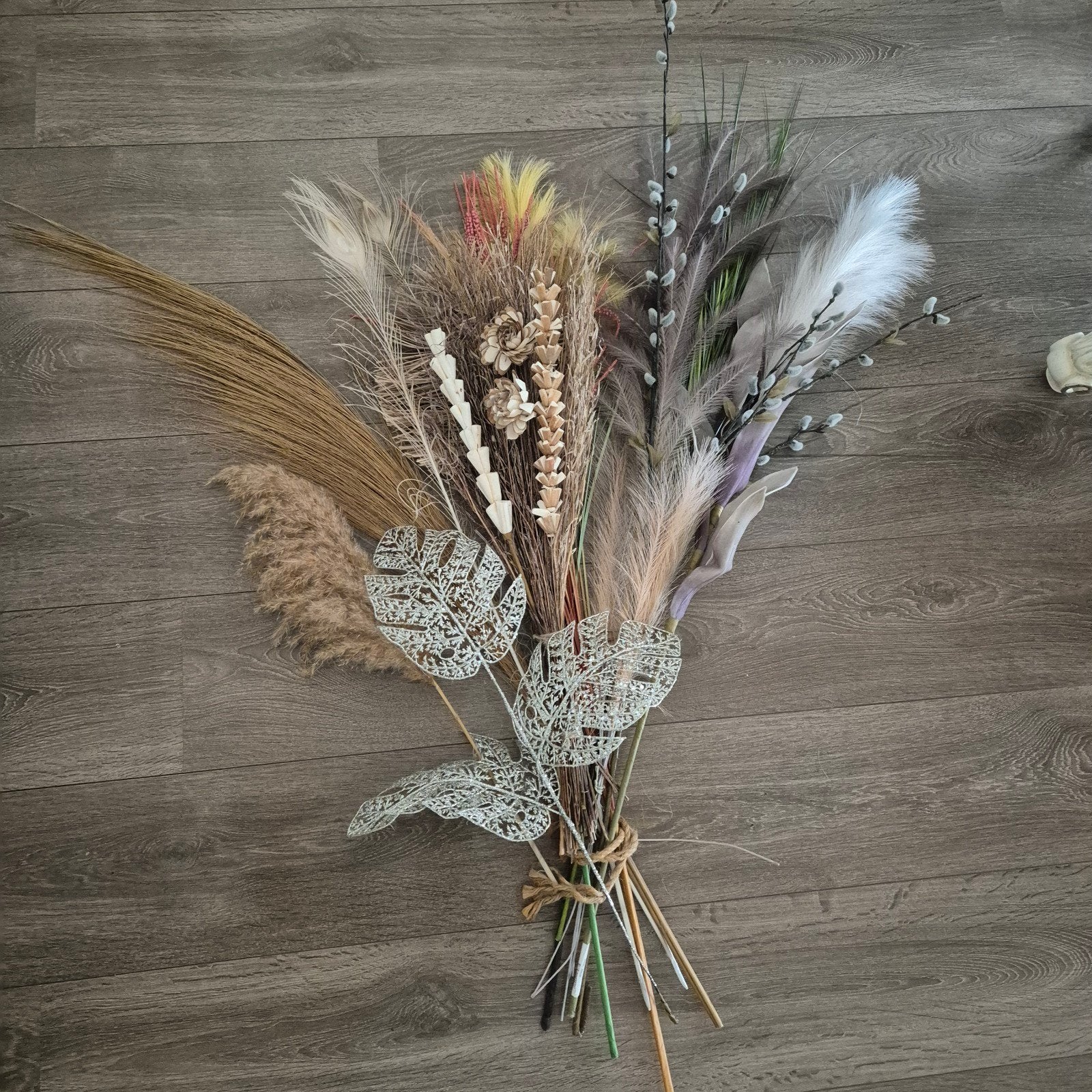 Een sfeervol droogboeket, samengesteld uit diverse takken, Ophalen